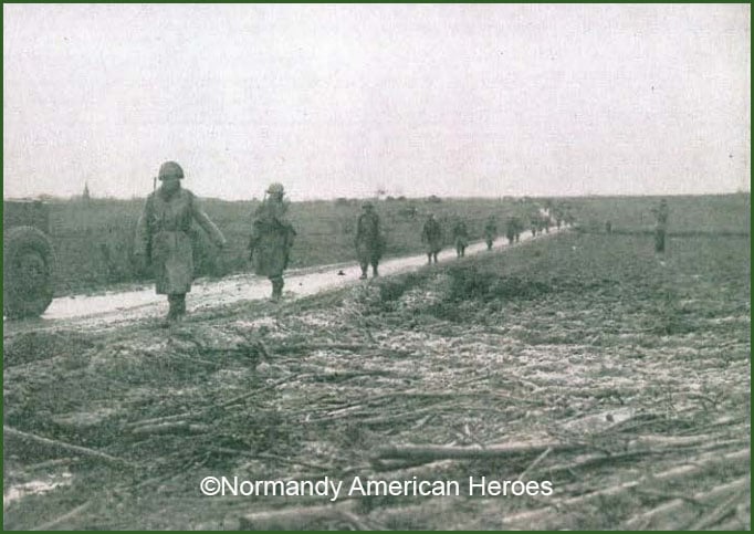 Men from 314th Infantry Regiment moving out from Frémonville