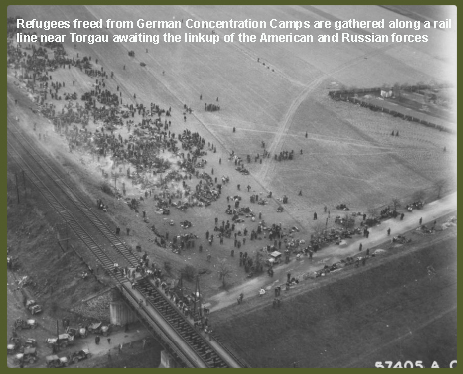 Refugees, Freed From German Concentration Camps, Are Gathered Along A Rail Line Near Torgau, Germany, Awaiting The Linkup Of The American And Russian Forces_